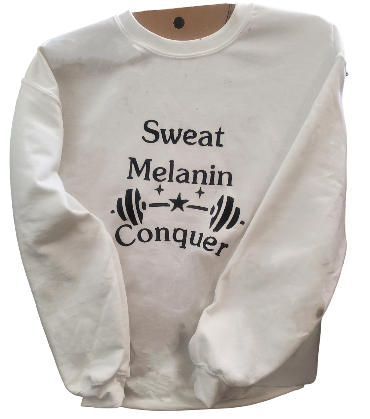 Sweatshirt with the phrase "Sweat Melanin Conquer" written in bold and stylish font. The design features a powerful message of determination and empowerment for individuals with melanin-rich skin. Perfect for showcasing your confidence and celebrating your journey of overcoming challenges. Available in various sizes and colors, these apparel items are a must-have for those who embrace their melanin and strive for success.