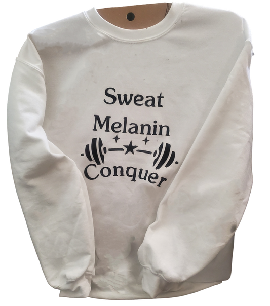 Sweatshirt with the phrase "Sweat Melanin Conquer" written in bold and stylish font. The design features a powerful message of determination and empowerment for individuals with melanin-rich skin. Perfect for showcasing your confidence and celebrating your journey of overcoming challenges. Available in various sizes and colors, these apparel items are a must-have for those who embrace their melanin and strive for success.